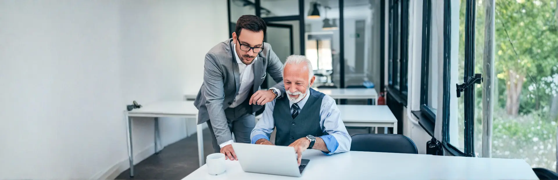 Two men working at a desk
